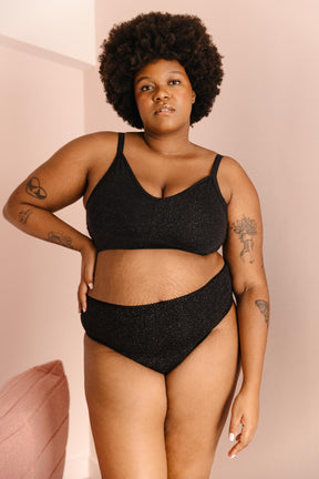 Tiffany is a size 105E and wears a size 3XL