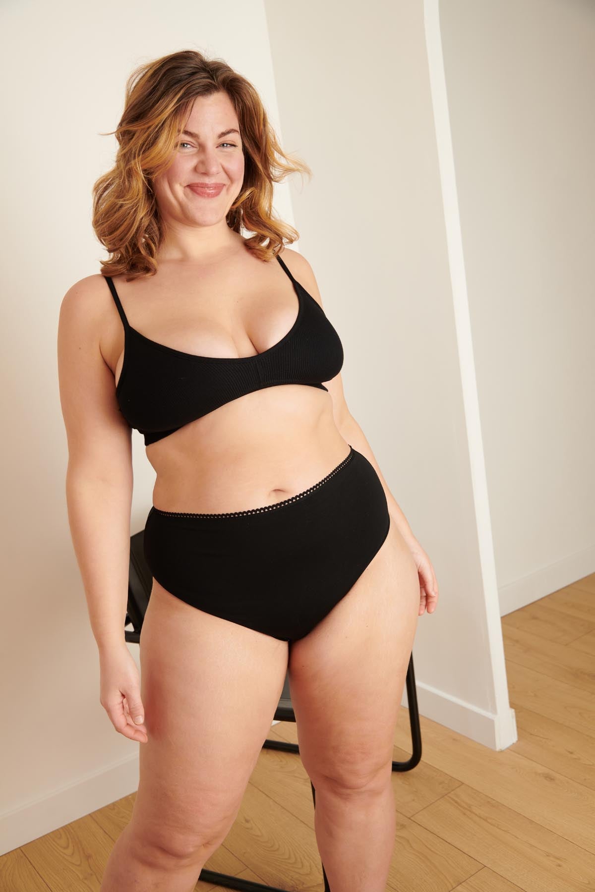 Isaure is a size 42 and wears a size L